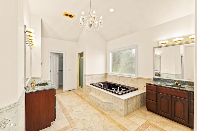 bathroom with vanity, a chandelier, plus walk in shower, tile patterned floors, and vaulted ceiling