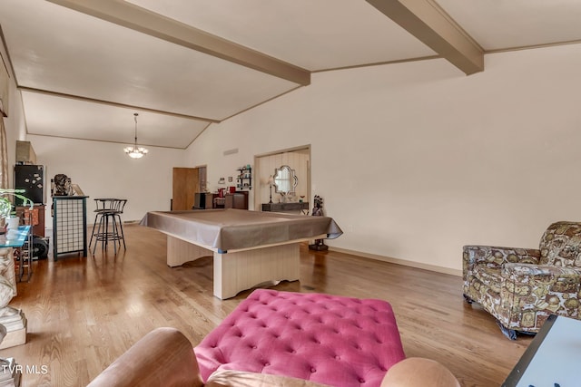 recreation room featuring a chandelier, pool table, lofted ceiling with beams, and light hardwood / wood-style floors