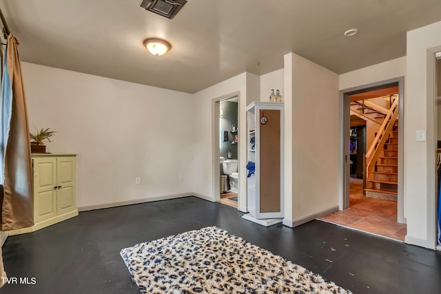 entryway featuring concrete floors