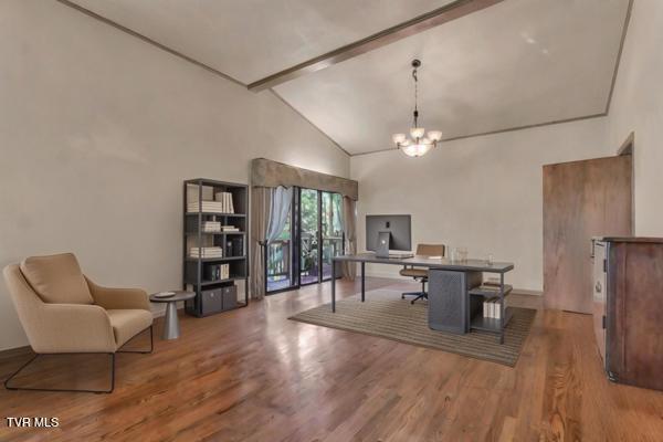 office area featuring beam ceiling, high vaulted ceiling, hardwood / wood-style flooring, and an inviting chandelier