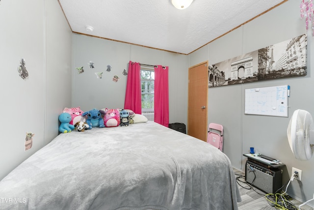 bedroom with a textured ceiling