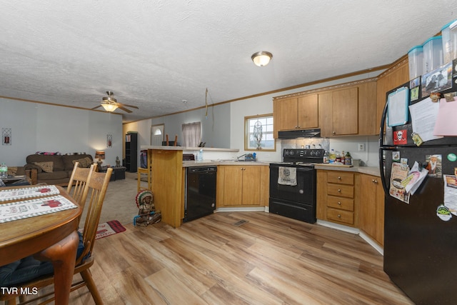 kitchen with kitchen peninsula, ornamental molding, ceiling fan, black appliances, and light hardwood / wood-style flooring