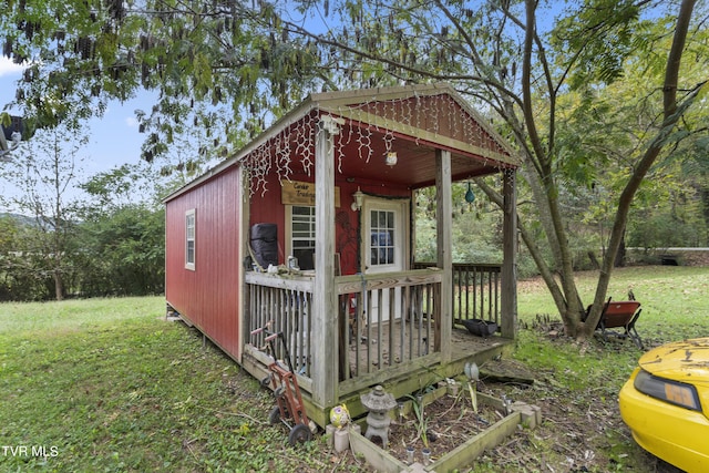 view of outdoor structure with a lawn