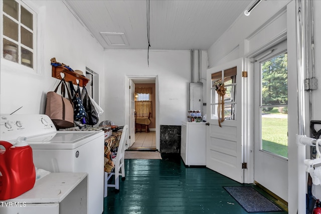 laundry room featuring washer / clothes dryer and dark hardwood / wood-style floors