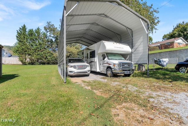 view of parking with a yard and a carport