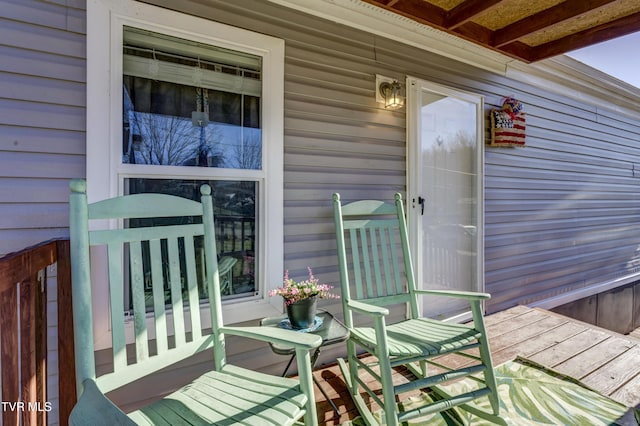 wooden terrace featuring a porch