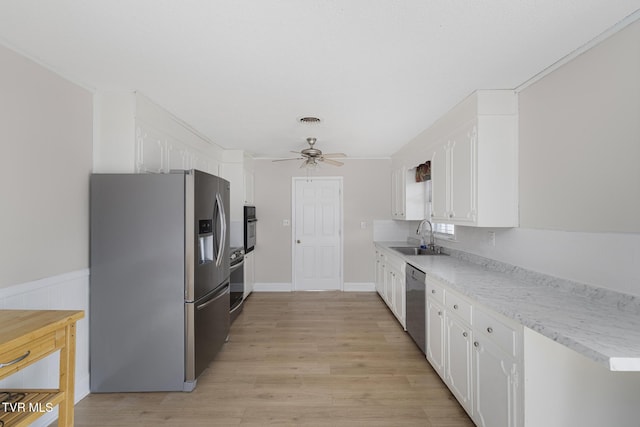 300 Wimberly Way, Bristol, TN 37620 - kitchen with ceiling fan, a sink, white cabinets, and stainless steel appliances