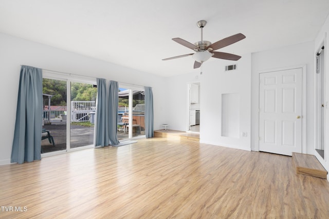 300 Wimberly Way, Bristol, TN 37620 - unfurnished living room featuring baseboards, visible vents, a ceiling fan, and light wood finished floors