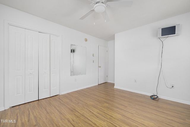 300 Wimberly Way, Bristol, TN 37620 - unfurnished bedroom featuring wood finished floors, a closet, a ceiling fan, and baseboards