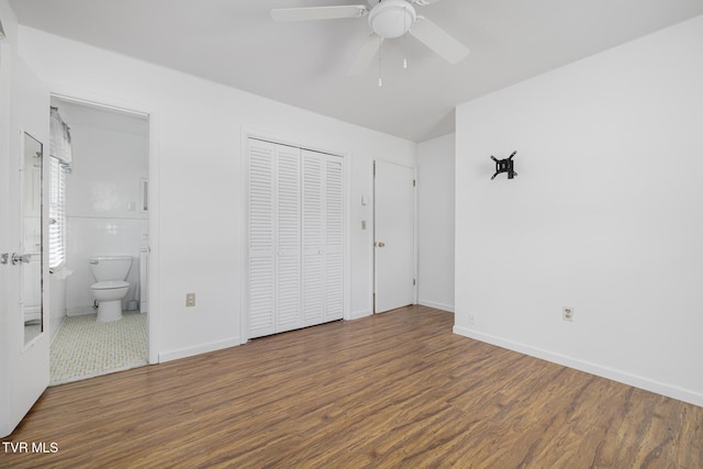 300 Wimberly Way, Bristol, TN 37620 - unfurnished bedroom with wood finished floors, a closet, ensuite bath, and baseboards