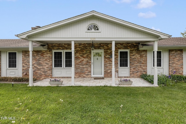 300 Wimberly Way, Bristol, TN 37620 - ranch-style home with brick siding and a front lawn