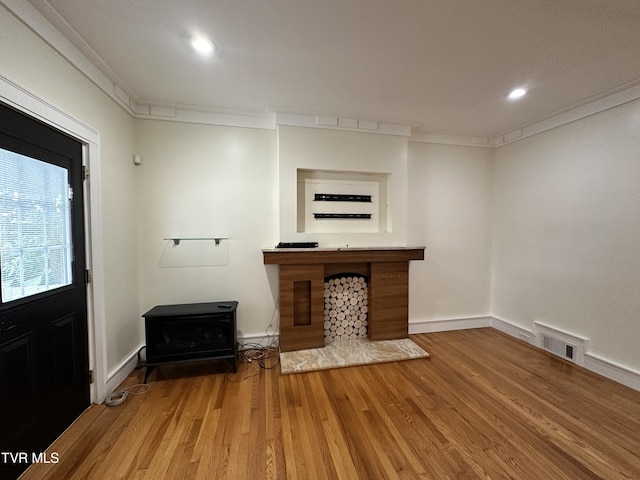 1357 Watauga St, Kingsport, TN 37660 - unfurnished living room with wood finished floors, recessed lighting, and crown molding