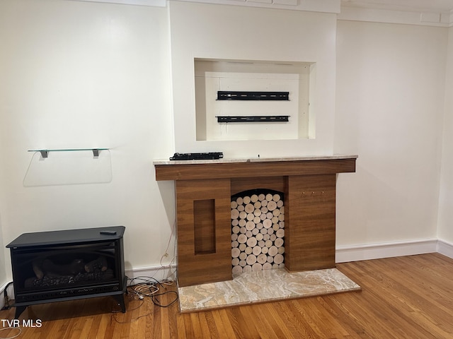 1357 Watauga St, Kingsport, TN 37660 - detailed view of wood finished floors and a wood stove