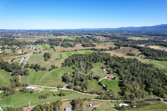 birds eye view of property featuring a rural view