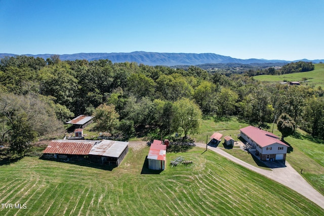 bird's eye view with a mountain view and a rural view