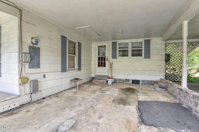 view of patio / terrace featuring electric panel