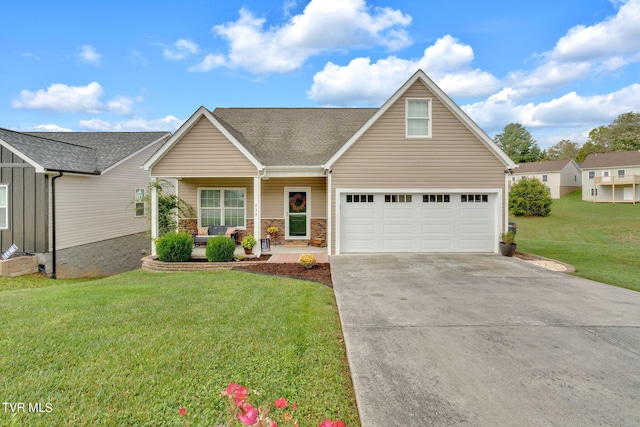 view of front of home featuring covered porch, concrete driveway, a front lawn, and roof with shingles