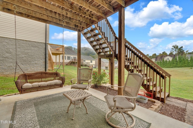 view of patio featuring stairway