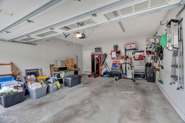 garage featuring a garage door opener