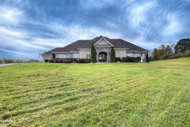 ranch-style house with a front yard