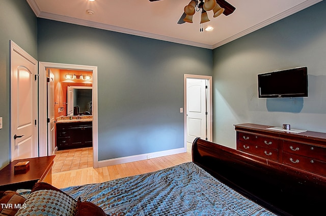 bedroom featuring crown molding, connected bathroom, ceiling fan, and light hardwood / wood-style flooring