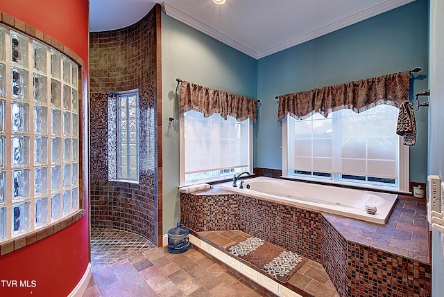 bathroom with separate shower and tub, crown molding, and a wealth of natural light