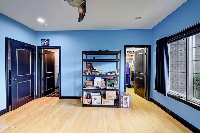 interior space with hardwood / wood-style floors