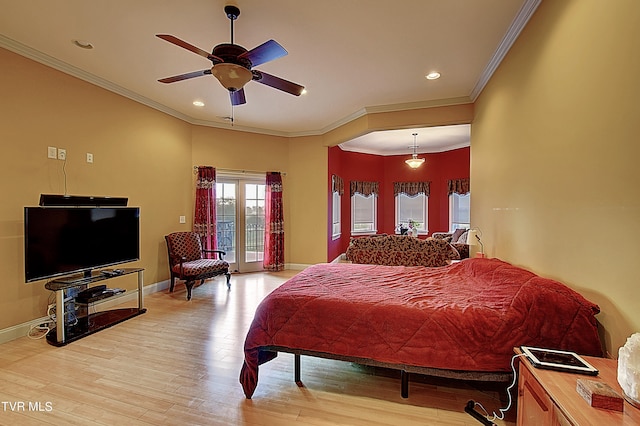 bedroom featuring ceiling fan, ornamental molding, and light hardwood / wood-style floors