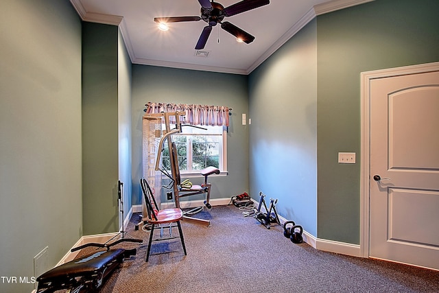 misc room with ceiling fan, crown molding, and carpet