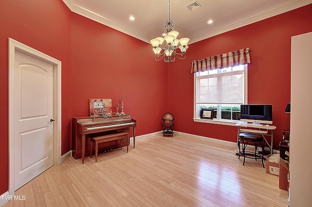 misc room featuring a notable chandelier, light wood-type flooring, and crown molding