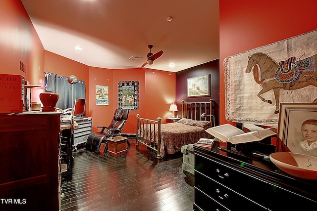 bedroom featuring dark hardwood / wood-style flooring