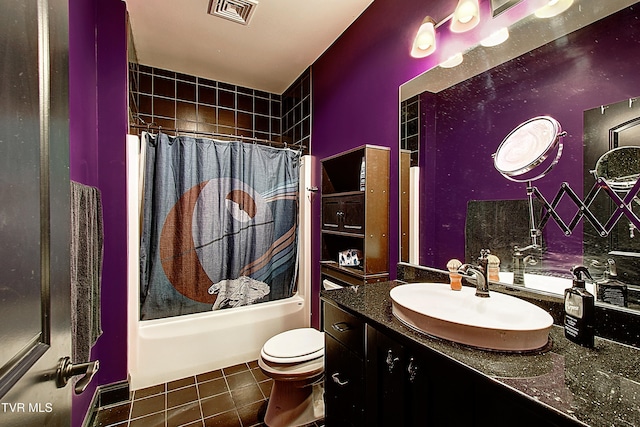 full bathroom featuring vanity, toilet, shower / bathtub combination with curtain, and tile patterned floors