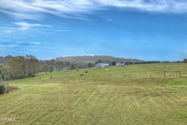 property view of mountains featuring a rural view