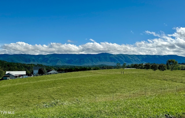 view of mountain feature featuring a rural view