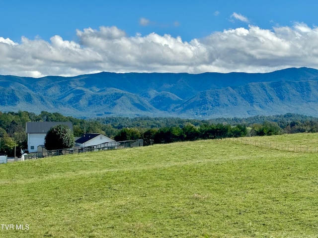 view of mountain feature with a rural view