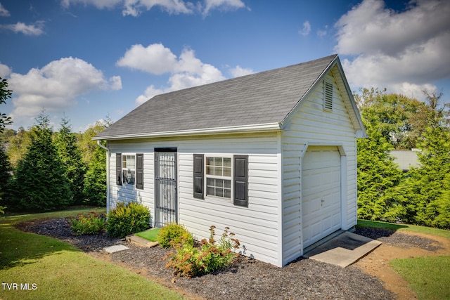 view of outdoor structure with a garage