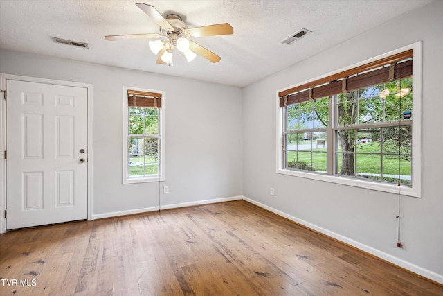 506 Pilgrim Ct Unit B, Johnson City, TN 37601 - spare room with baseboards, hardwood / wood-style floors, and visible vents