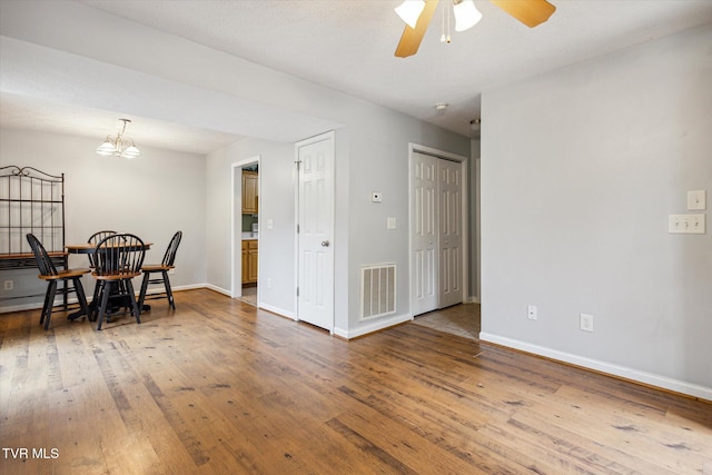 506 Pilgrim Ct Unit B, Johnson City, TN 37601 - dining room featuring baseboards, wood finished floors, visible vents, and ceiling fan