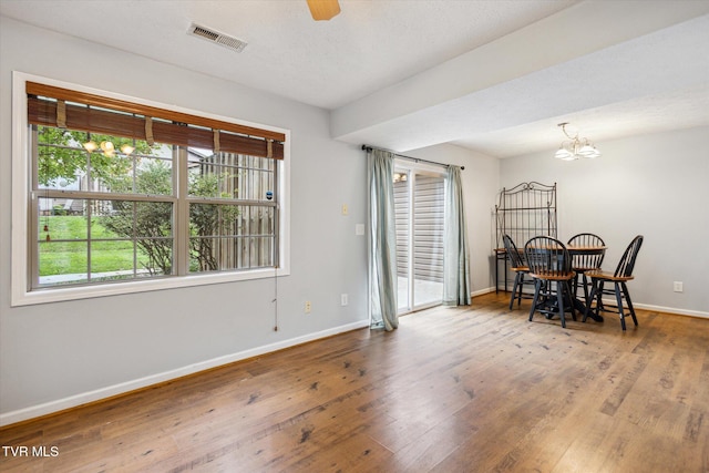 506 Pilgrim Ct Unit B, Johnson City, TN 37601 - dining area with a wealth of natural light, wood finished floors, visible vents, and baseboards