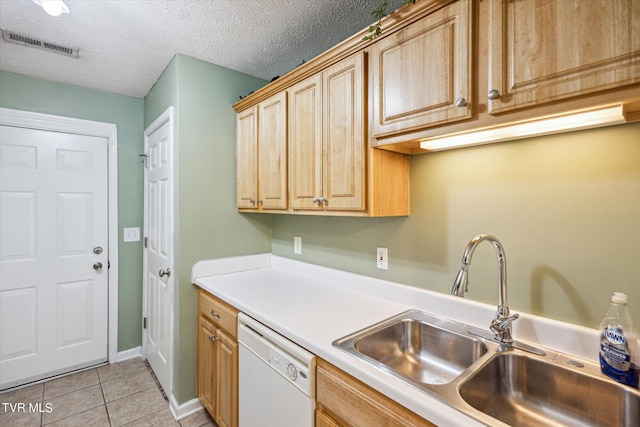 506 Pilgrim Ct Unit B, Johnson City, TN 37601 - kitchen with white dishwasher, a sink, light tile patterned flooring, light countertops, and visible vents