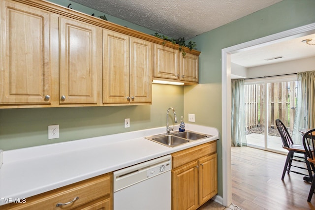 506 Pilgrim Ct Unit B, Johnson City, TN 37601 - kitchen with light countertops, dishwasher, visible vents, a sink, and a textured ceiling