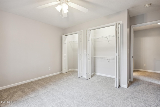 506 Pilgrim Ct Unit B, Johnson City, TN 37601 - unfurnished bedroom featuring ceiling fan, baseboards, multiple closets, and carpet