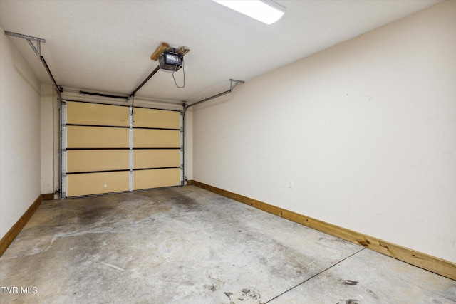 506 Pilgrim Ct Unit B, Johnson City, TN 37601 - garage with baseboards and a garage door opener