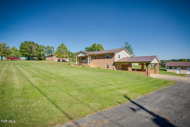 ranch-style home featuring a front yard