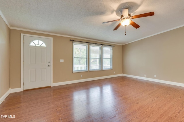 22088 Parks Mill Rd, Abingdon, VA 24211 - entryway featuring light wood-style floors, a ceiling fan, ornamental molding, a textured ceiling, and baseboards