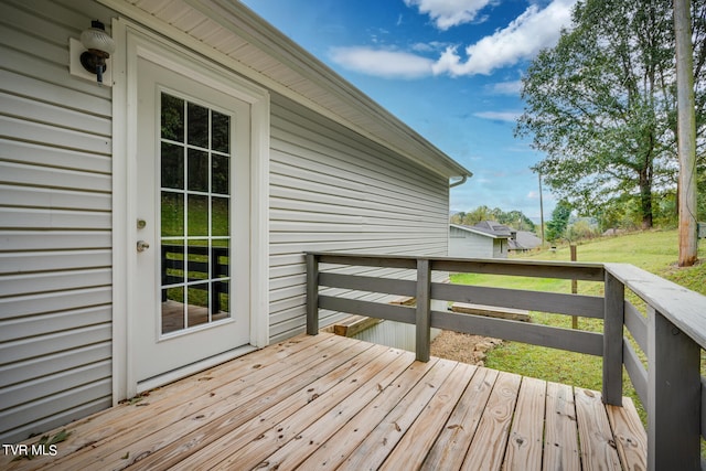 deck featuring a yard