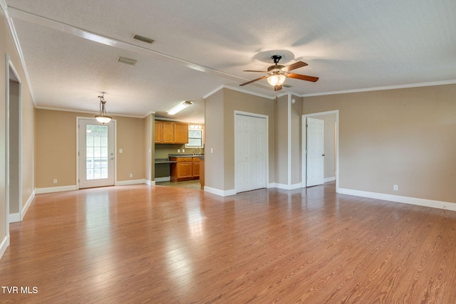 22088 Parks Mill Rd, Abingdon, VA 24211 - unfurnished living room featuring a ceiling fan, a textured ceiling, light wood-type flooring, baseboards, and ornamental molding
