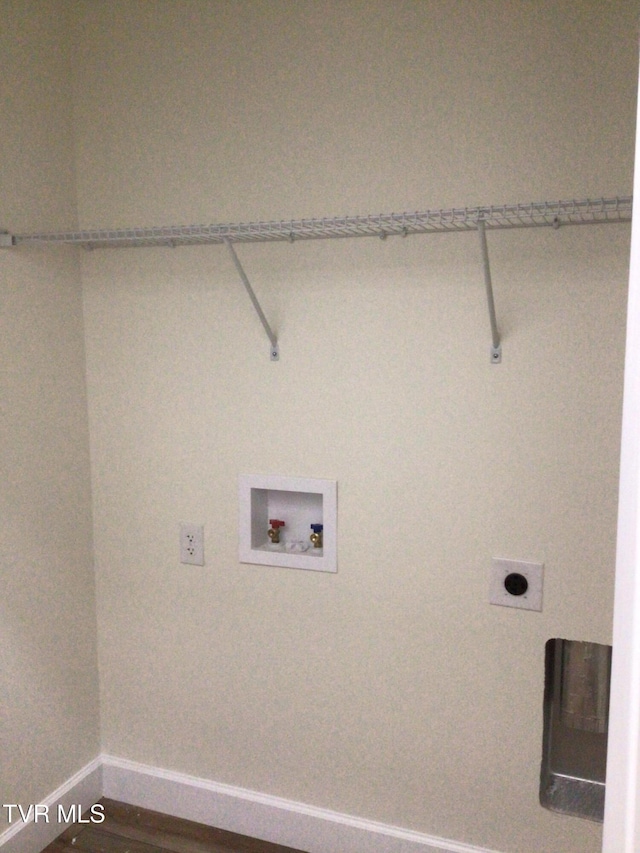 washroom featuring hookup for an electric dryer and washer hookup