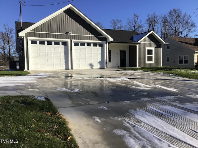 ranch-style home with a garage