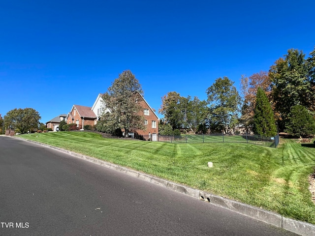 exterior space featuring a front yard